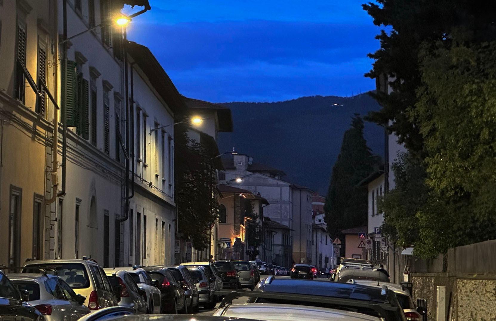 Night street scene in Florence Italy.